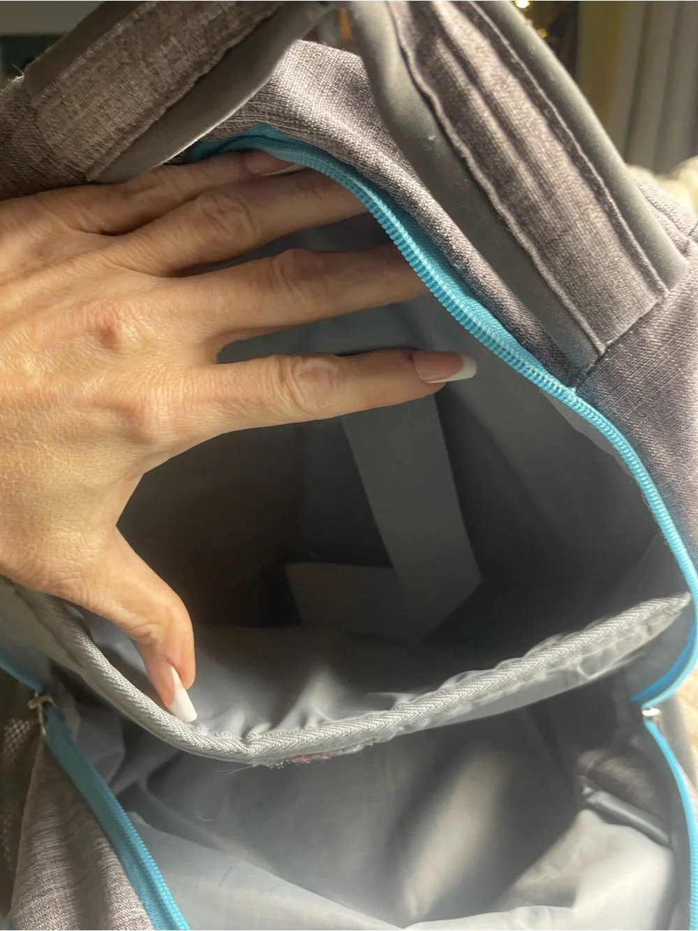 Reebok Gray Backpack with Teal Accents